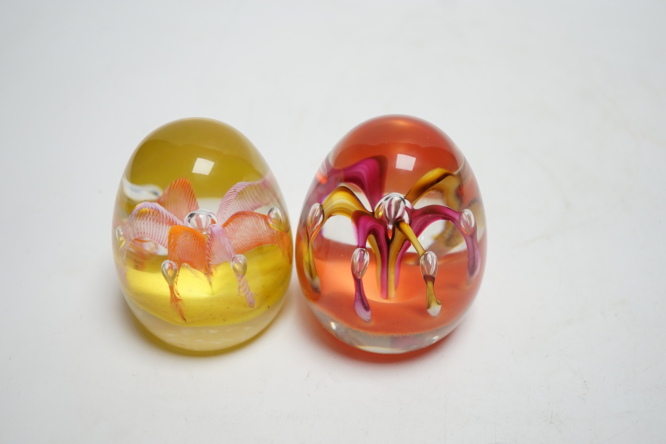 Two Paul Ysart ‘fountain’ glass paperweights, Harland/Highland period, one with Highland paperweights label, 7.5 and 7.7cm